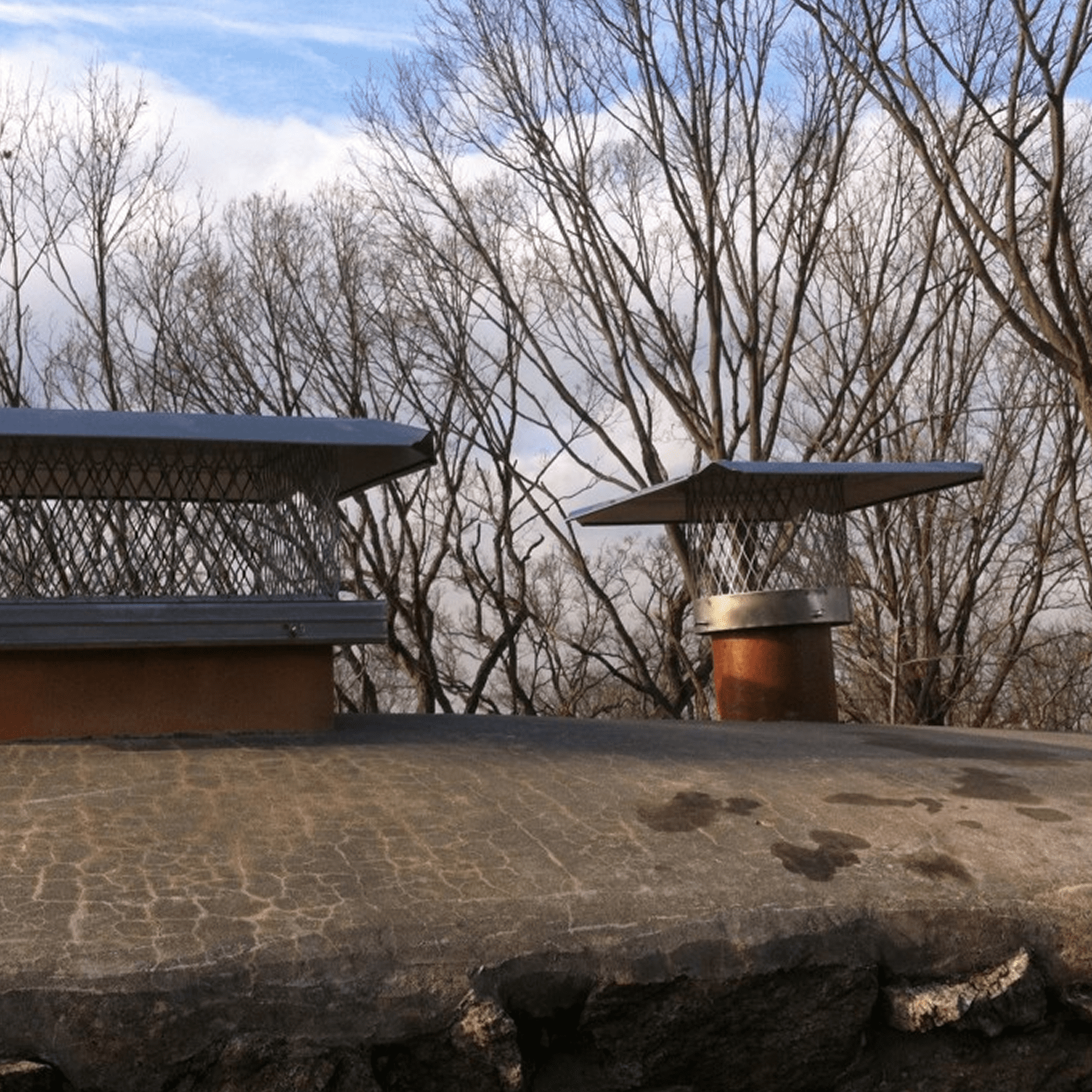 Chimney caps on a rooftop